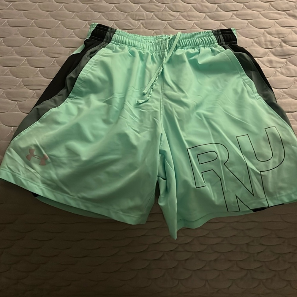 Under Armor teal running shorts